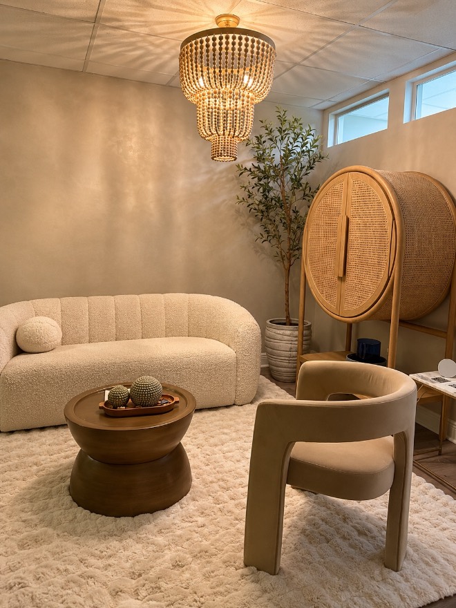 The Aloe lounge with a cream sofa and soft light